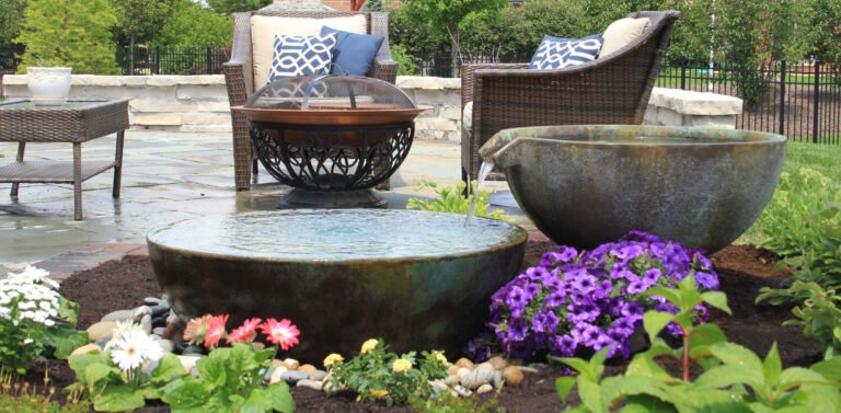 Two spillway bowls decorate this small backyard