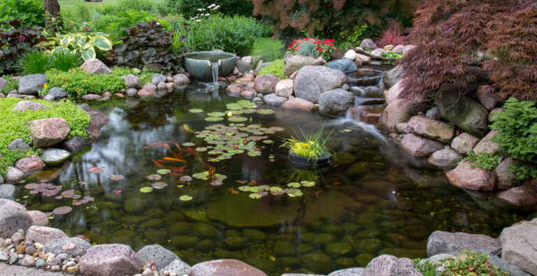 The combination of water feature bowl and waterfalls cascading into the pond
