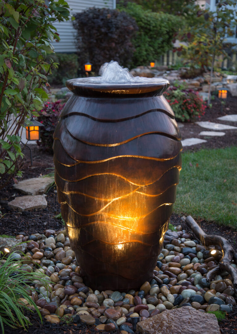 outstanding scalloped urn with water feature