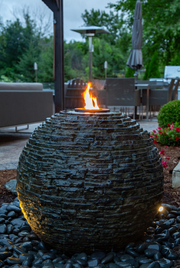 Stacked Slate Sphere with flame giving it a special touch