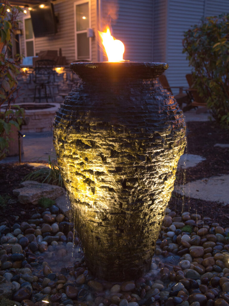 Stacked slate Urn with beautiful small Illuminating flame on the top