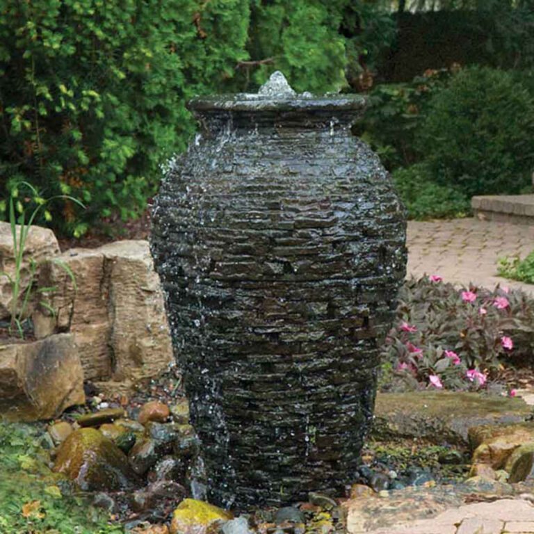 large stacked slate urn splashing water for a decorative fountain